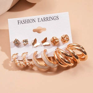 Twelve-piece gold earring set with rhinestones, pearls, butterflies, and C-shaped hoops