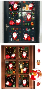 Detail view of festive Christmas static window stickers featuring Santa Claus and snowflakes