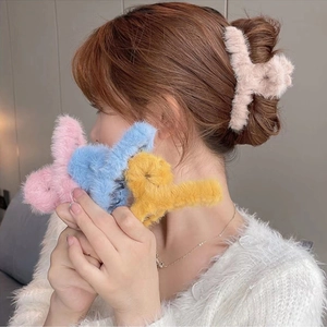 Large plush shark hair claw clip in pastel colors for winter hair styling