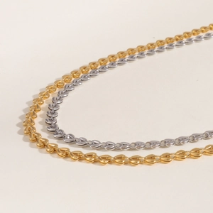 18k gold and silver stainless steel necklace set with hollow heart shaped woven links