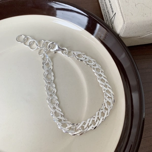 Minimalist S925 sterling silver chain bracelet with extension on vintage ceramic plate