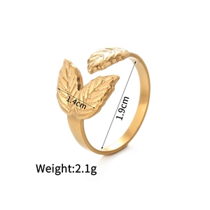 Detail view of 14K gold leaf ring showing dimensions 1.4cm length and 1.9cm diameter