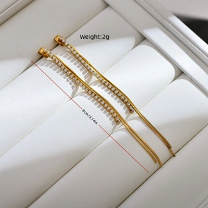 Gold plated geometric tassel chain earrings with zircons measuring 8cm in length