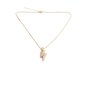Fashion gold lightning bolt pendant necklace with sparkling cubic zirconia on white background