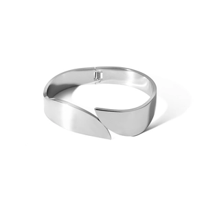 Macro detail of high-polished stainless steel cuff bracelet with layered leaf design