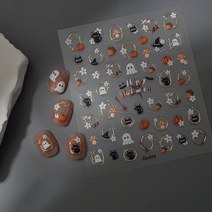 3D Halloween nail stickers with gold-embossed black cats, ghosts, and pumpkins