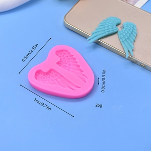 Pink heart angel wings silicone mold for DIY cake baking and resin craft projects