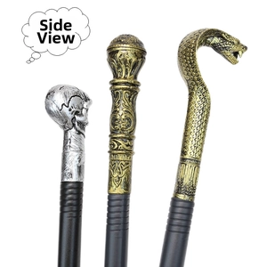 Detailed views of gold cobra, skull, and textured sphere toppers for Halloween scepters