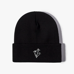 Classic black knitted beanie featuring three white mushroom embroidery in a casual style