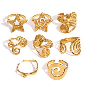 Set of 8 gold titanium steel rings featuring hollow star and spiral designs for women