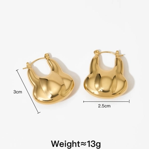 Detailed view of vintage gold-plated stainless steel earrings with 3cm height dimensions