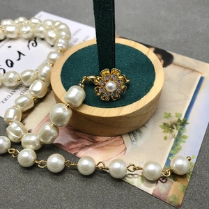 Vintage gold plated flower pendant necklace with baroque pearls and a matching pearl ring