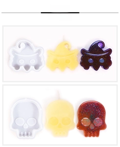 Detail of Halloween ghost and skull silicone molds with resin and wax candle samples