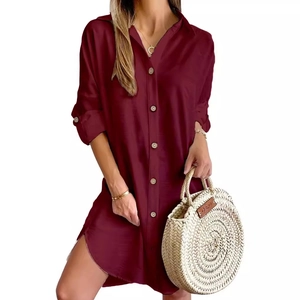 Women's burgundy long sleeve button-up shirt dress with pockets and a classic lapel collar