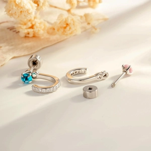 Titanium steel U-shaped earrings with micro-set pink and blue cubic zirconia stones