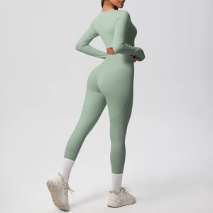 Close-up of high-waist yoga leggings with functional side pocket and ergonomic seams