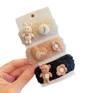 Three-piece set of cute fuzzy lamb wool hair clips with cartoon bear and heart charms