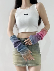 Close-up of Y2K gradient wool knit arm warmers showing vibrant rainbow textures