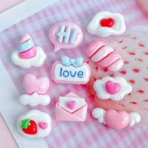 Pink and white resin charms collection with heart clouds and unicorns for DIY crafts
