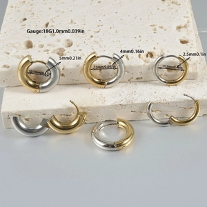 Minimalist two-tone stainless steel hoop earrings in gold and silver finish