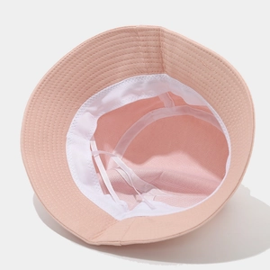 Pink bucket hat with inner adjustable drawstring and sweatband for outdoor sun protection