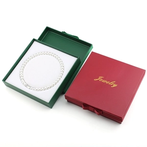 Square jewelry gift box with bow ribbon for necklaces in burgundy and dark green colors