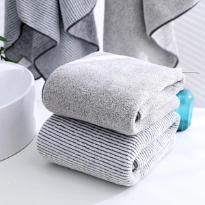 Bamboo charcoal fiber bath towel set in solid grey and striped coral fleece fabric
