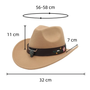 Detail of felt cowboy hat with bull skull metal ornament and floral embroidery accents