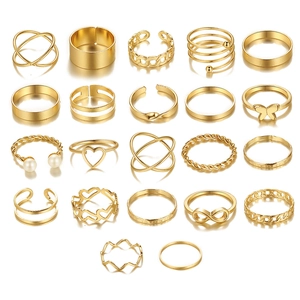 Detailed grid view of a 21-piece gold ring set featuring heart, butterfly, and leaf designs