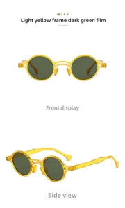 Detail view of vintage small round sunglasses with pale yellow frame and dark green lenses