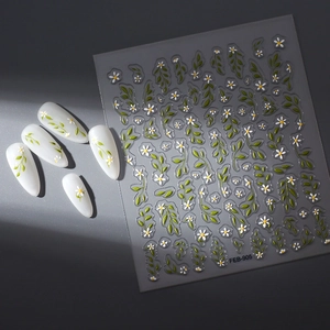 3D embossed nail stickers featuring white daisies and green leaves for elegant nail art