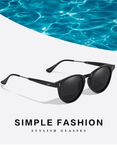 Close-up of TR5095 black polarized sunglasses temple showing CE marking and size specs