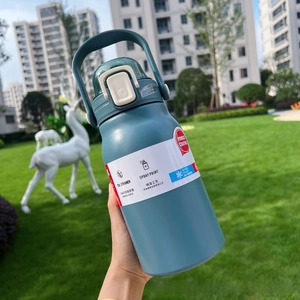 Detail of blue matte sports flask with 304 stainless steel tea strainer and carry handle