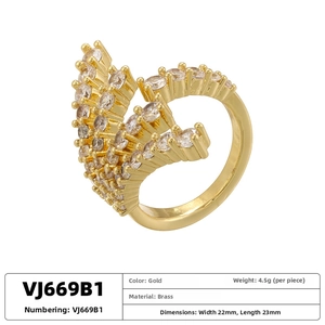 Detailed view of gold brass ring with layered white zircon pavé and product size info