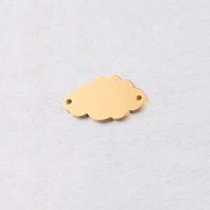 Close-up of golden cloud-shaped stainless steel pendant with a polished mirror finish