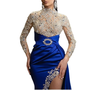 Elegant royal blue evening dress with shimmering rhinestones and sheer mesh bodice