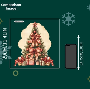Size comparison of Christmas tree wall sticker showing 29cm height next to a mobile phone