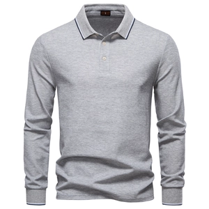Detailed close-up of grey long-sleeved polo shirt showing piqué cotton texture and collar
