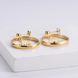 Minimalist gold butterfly earrings with hollow animal design and polished metal finish