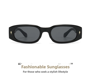 Front view of black narrow rectangular sunglasses with elegant gold arrow metal accents