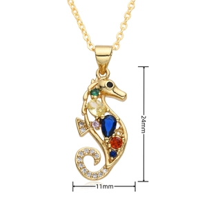 Detail view of colorful seahorse pendant with size markings 24mm height and 11mm width
