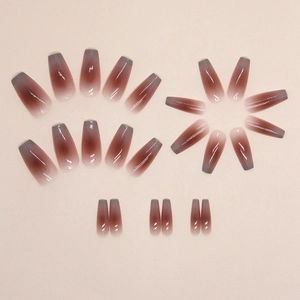 Long coffin gradient press-on nails in deep reddish brown to smoky grey ombre finish