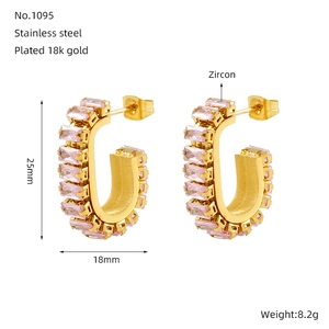 U-shaped stainless steel earrings with 18k gold plating and pink zircon inlay detail