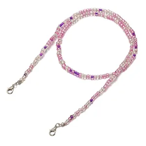 Detailed shot of colorful beaded eyeglass chain with silver metal lobster clasps