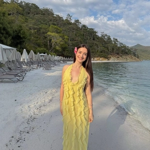 Slim fit yellow tiered maxi dress with ruffles for beach vacation outdoors