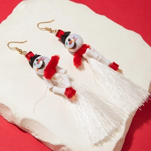 Detailed view of snowman tassel earrings with red plush scarf and white beads for Christmas