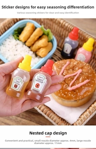 Detail of mini sauce squeeze bottles with dual-cap design for honey mustard and ketchup