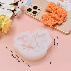 Detail of flower silicone mold showing petal texture with dimensions 9cm by 2.6cm