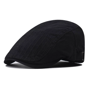 Detail of black cotton duckbill hat with vertical stitching and metal side buckle