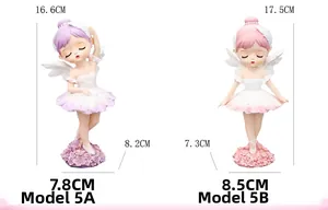 Detailed size comparison of pink and purple resin ballet girl figurines with wings